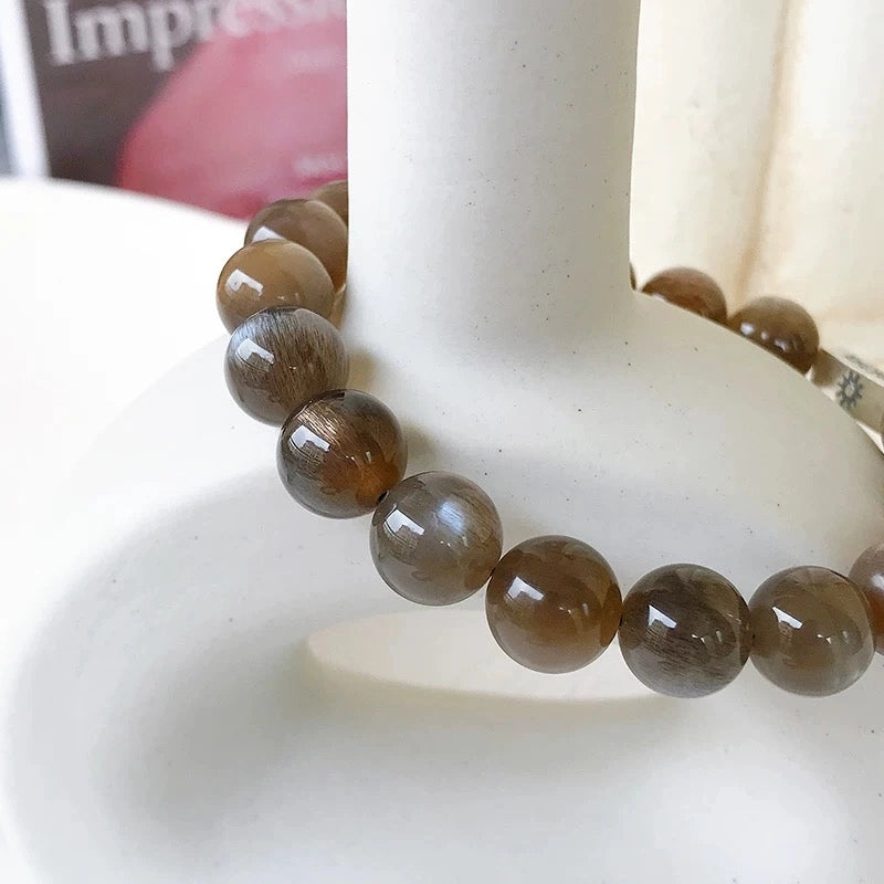 Moonstone Bracelet with Sun & Moon Charms – Mystical Black Sunstone Energy Jewelry