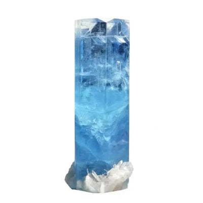 Natural aquamarine crystal stone with ocean blue color and transparent texture