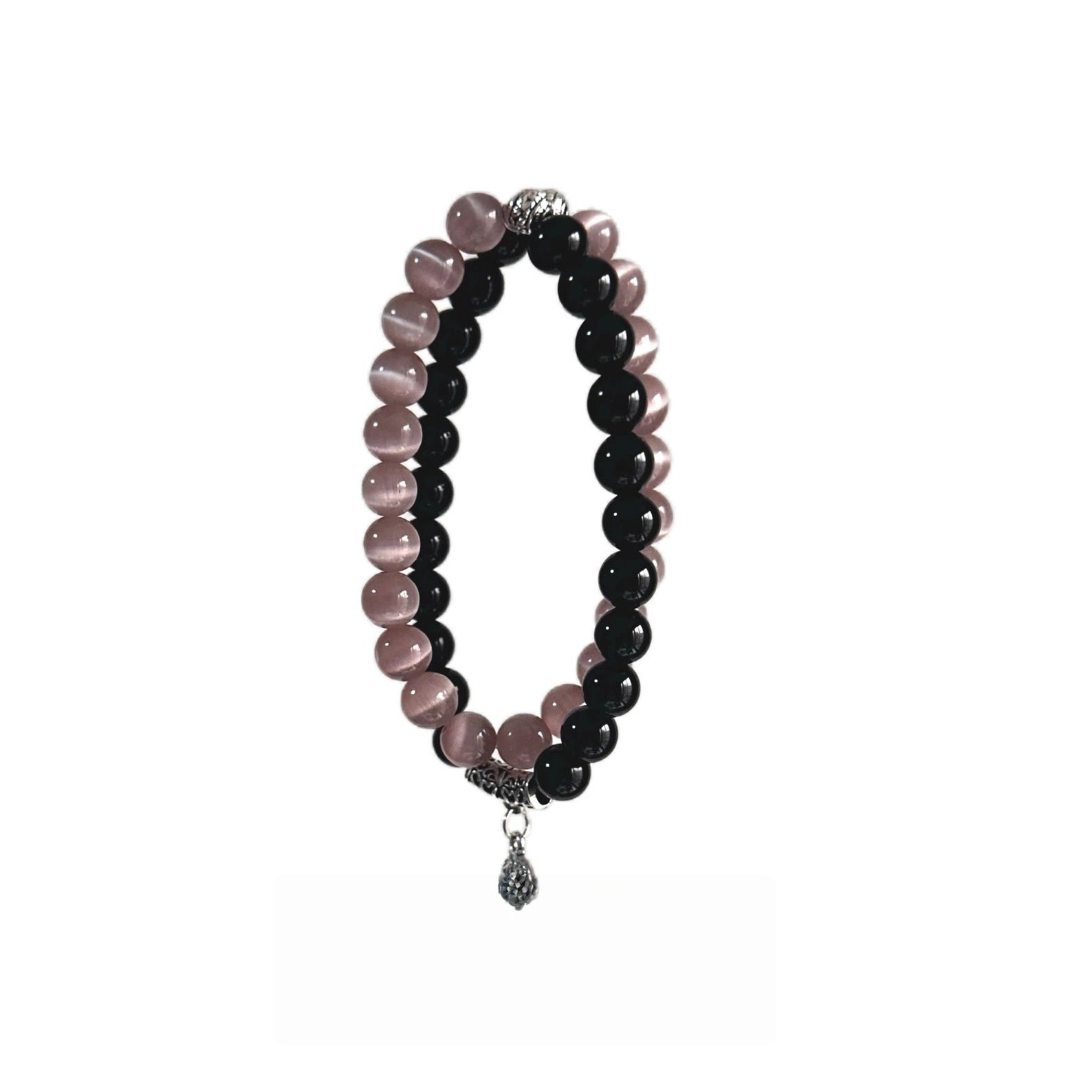 Black obsidian bracelet with pink cat eye crystal, designed to protect energy and attract love