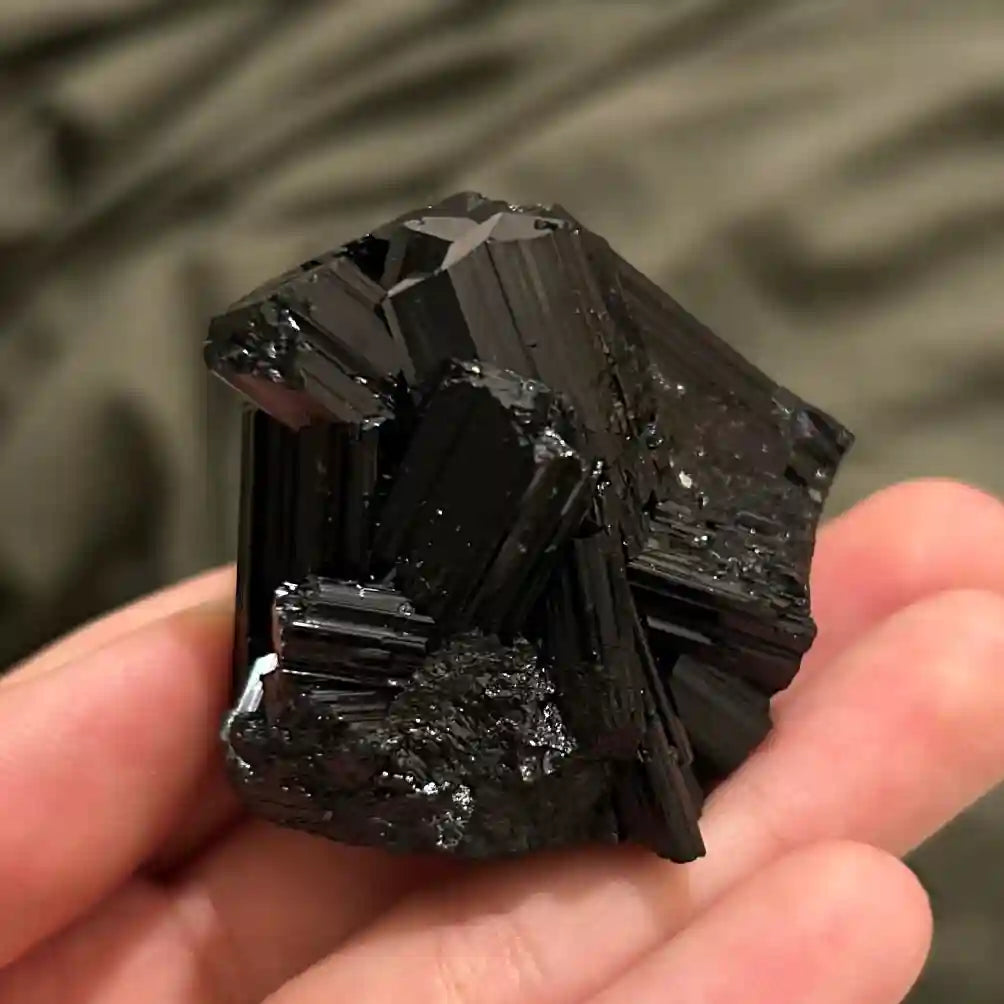 Black tourmaline crystal symbolizing protection
