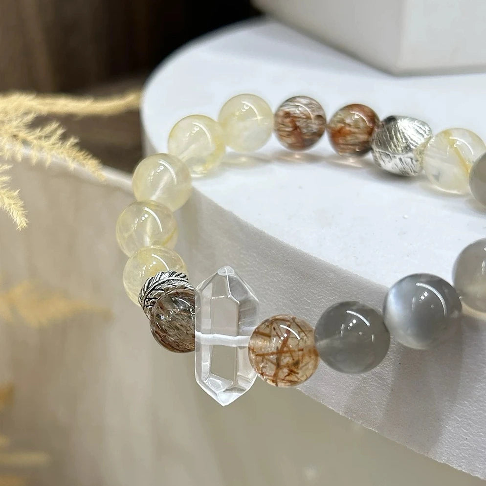 Healing crystal bracelet featuring citrine flower, moonstone, and gold obsidian