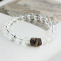 Clear quartz bead bracelet with natural agarwood, designed to cleanse energy and support inner calm