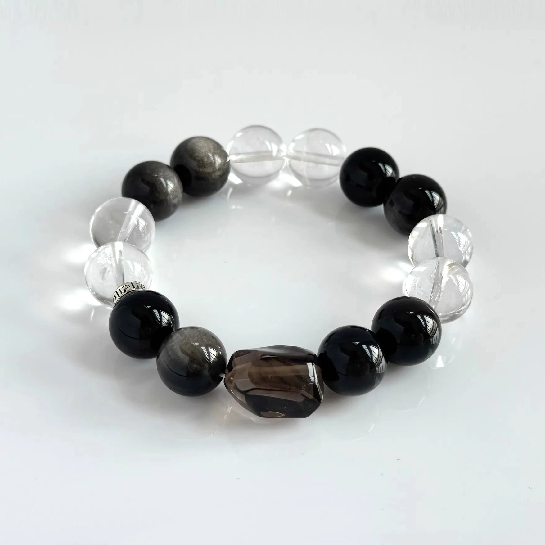 Mens crystal bracelet featuring black obsidian and clear quartz stone for protection and calming
