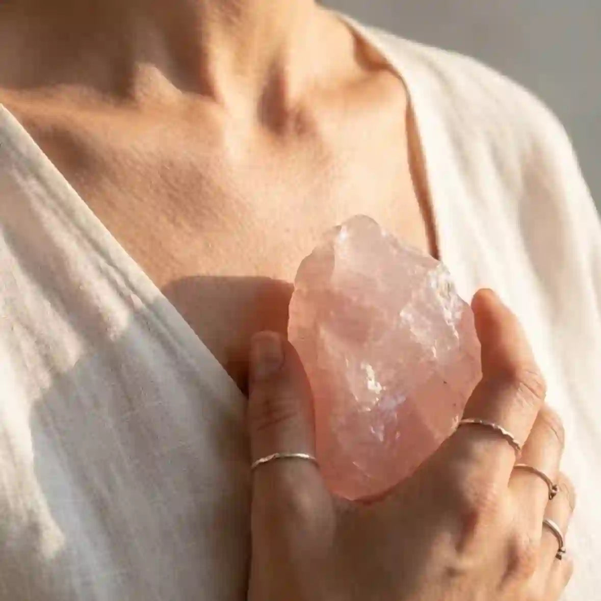 Rose quartz crystal energy with heart chakra, love and self-love symbolism
