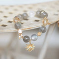 Grey moonstone crystal bracelet for women, promoting emotional clarity and spiritual balance