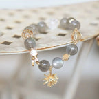 Grey moonstone crystal bracelet for women, promoting emotional clarity and spiritual balance