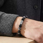 Silver obsidian bracelet for men, symbolizing protection and strength