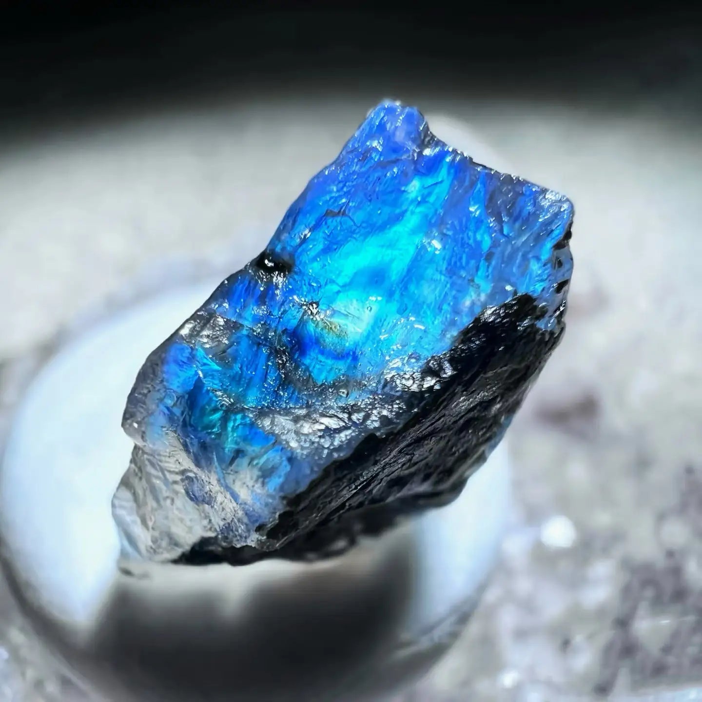 Moonstone healing stone with natural shimmer and chakra symbolism