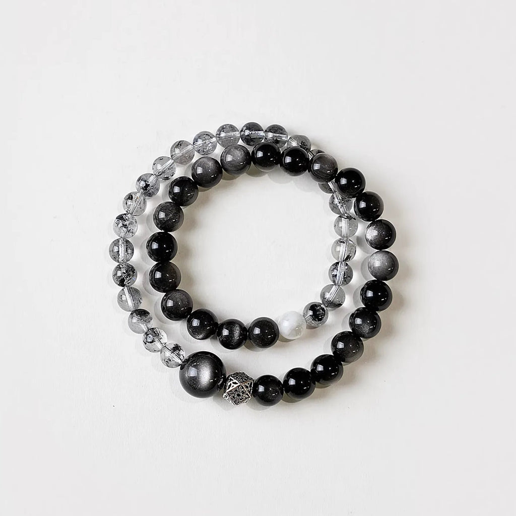 Natural crystal bracelet featuring double strand silver obsidian