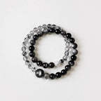 Natural crystal bracelet featuring double strand silver obsidian