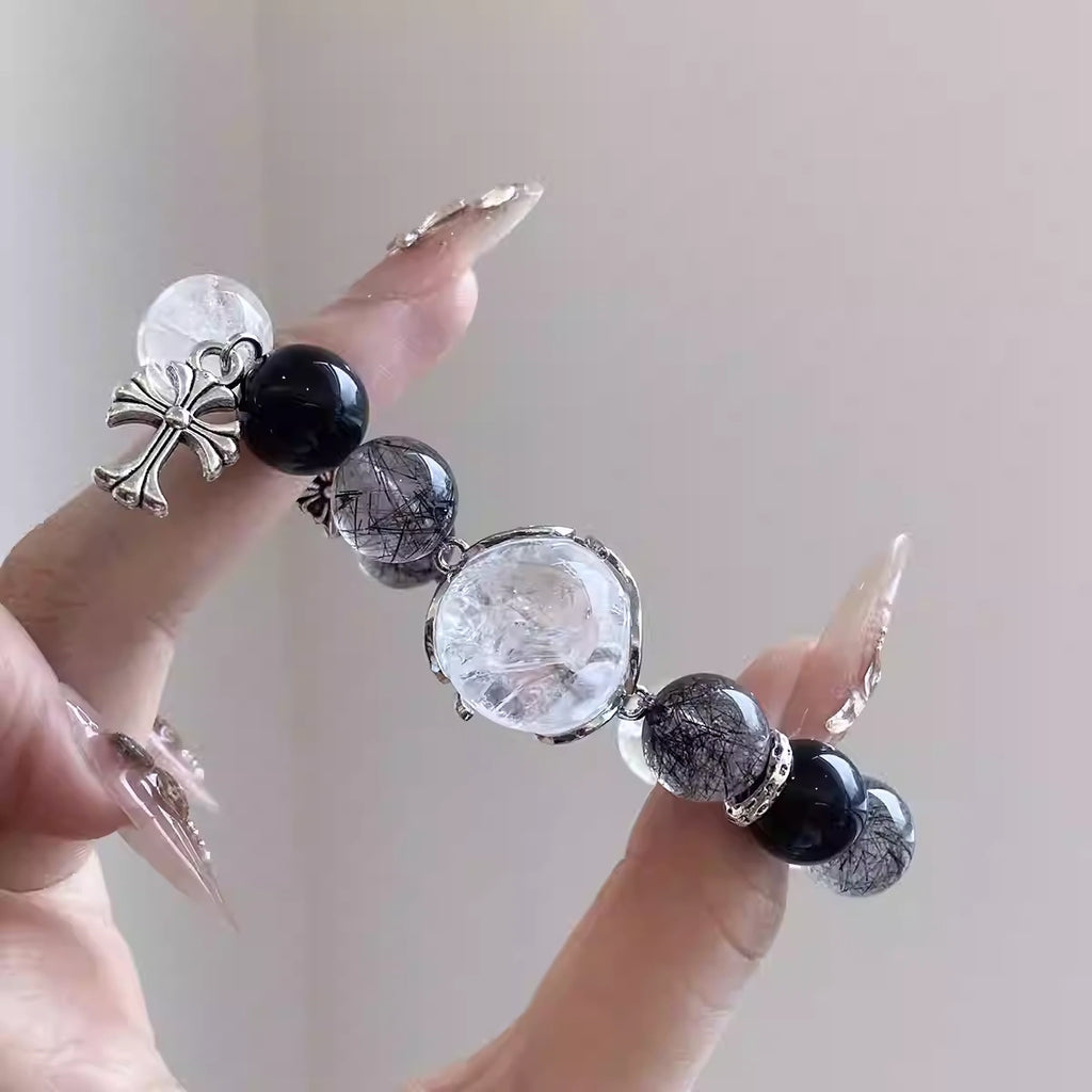 Obsidian bracelet black combining clear quartz crystal beads in a balanced design