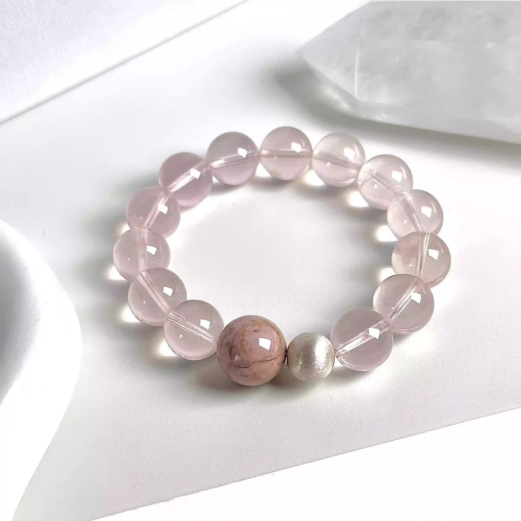 Rose quartz bead bracelet featuring smooth pink gemstone crystals for love