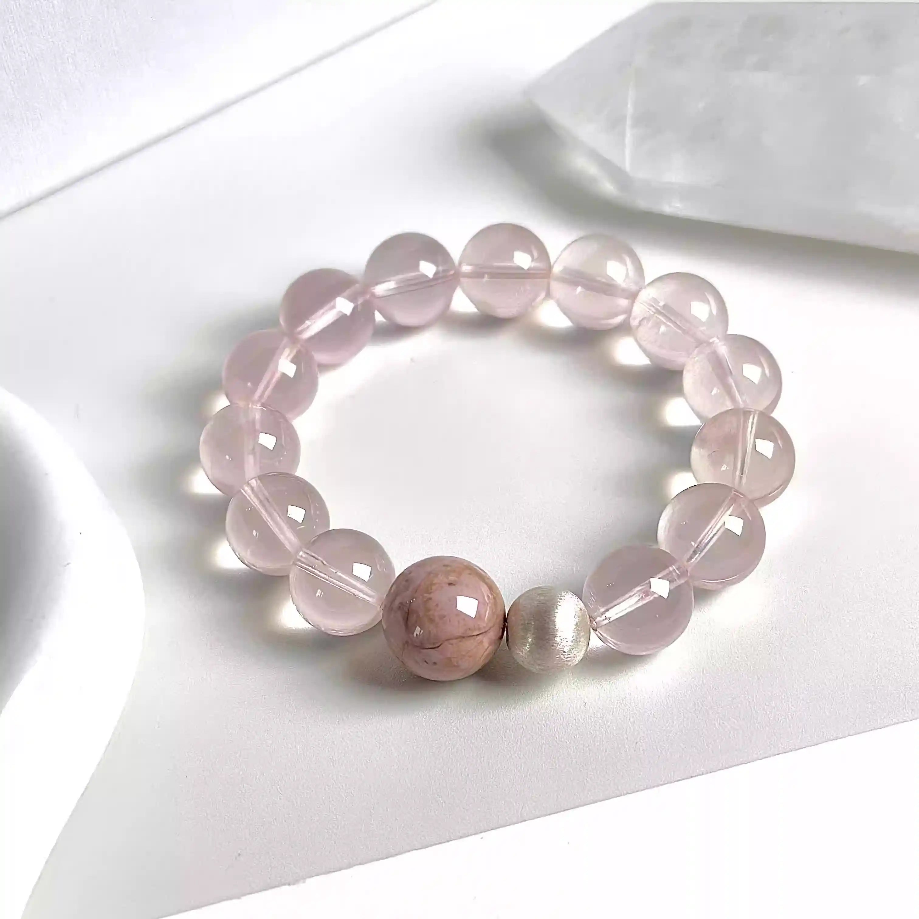 Rose quartz bead bracelet featuring smooth pink gemstone crystals