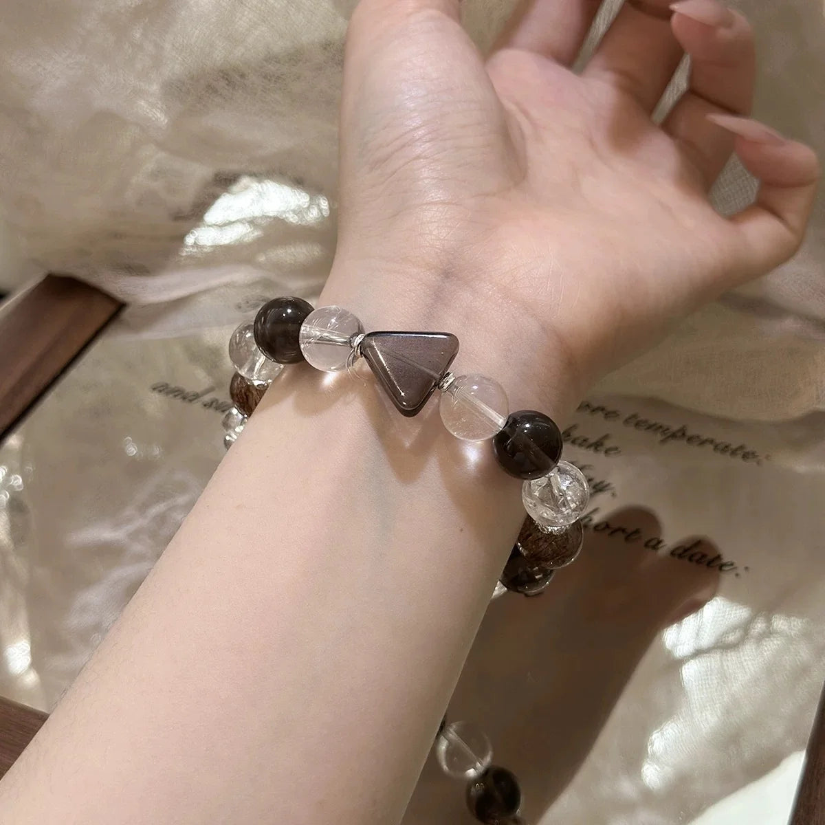 Smoky quartz and clear quartz bracelet, symbolizing energy cleansing, inner calm