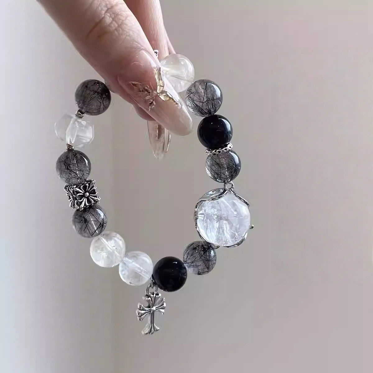 Natural stone bracelet with glossy obsidian beads, layered black crystal jewelry for mindful styling.