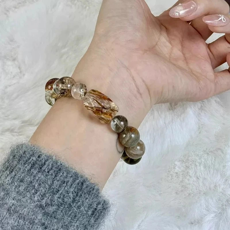 Natural Black Super Seven and black rutilated quartz bracelet for protection, energy power, and abundance.