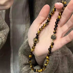 Handcrafted Chinese vintage tiger eye bracelet with natural stone beads for balance, courage, and spiritual protection.