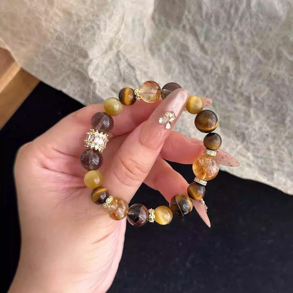 Healing citrine and tiger eye bracelet for financial success, strength, and energy balance – authentic crystal accessory.