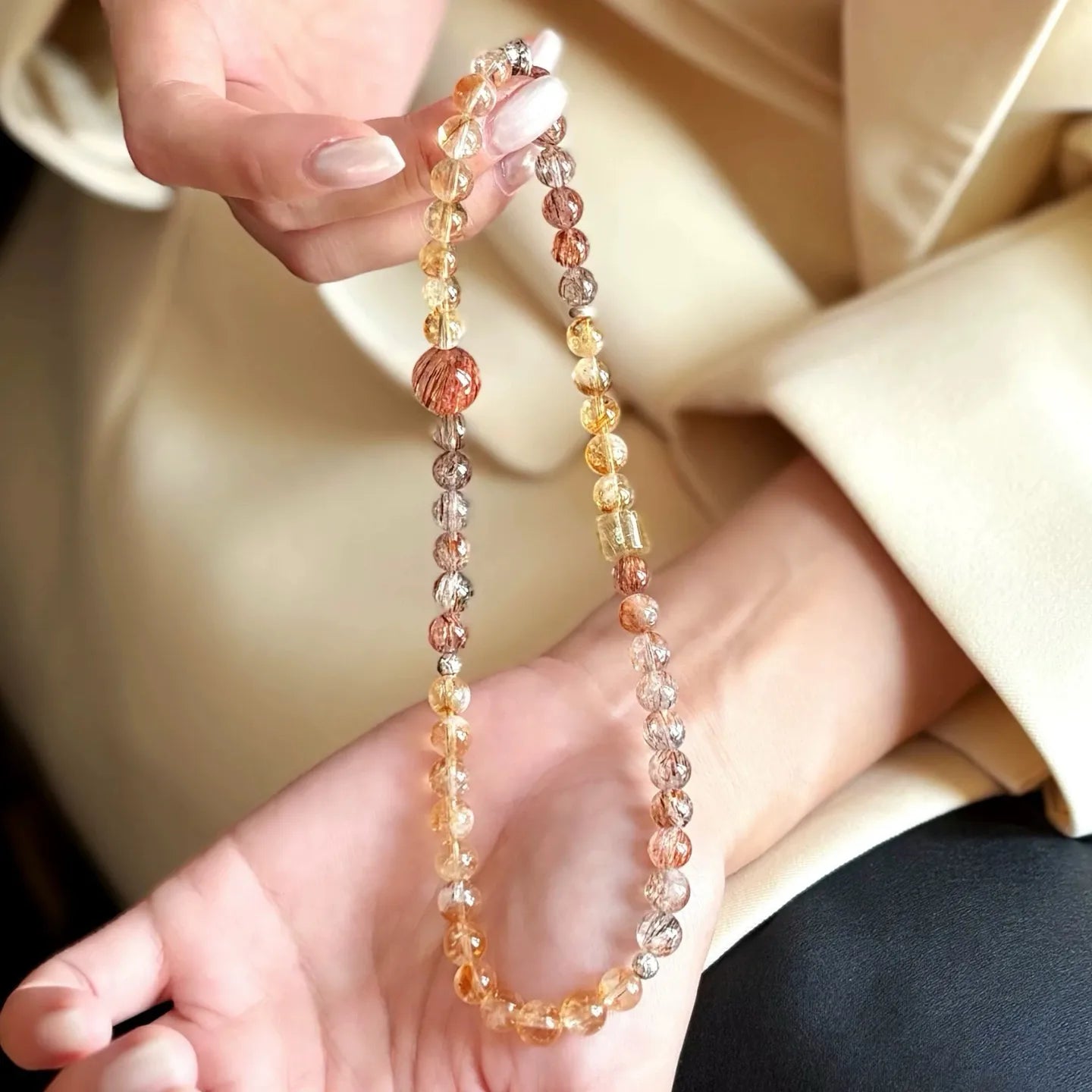 Double strand crystal bracelet made with golden citrine beads and dark black super seven crystals.