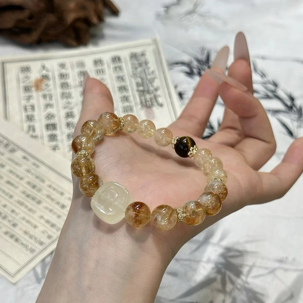 Citrine crystal bracelet displayed as a symbol of wealth, abundance, and positive prosperity energy – elegant healing crystal bracelet.