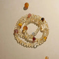Multi wrap citrine crystal bracelet with gold tower beads, handcrafted crystal bracelet with polished yellow stones.