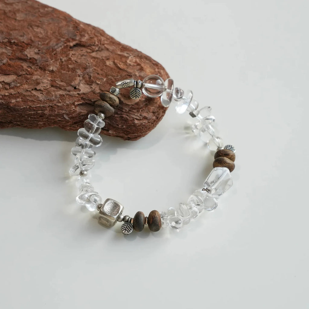 Clear quartz and agarwood bracelet designed for quiet moments and mindful daily wear.