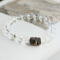 Elegant white quartz bracelet with natural agarwood, designed to cleanse energy and support inner calm.