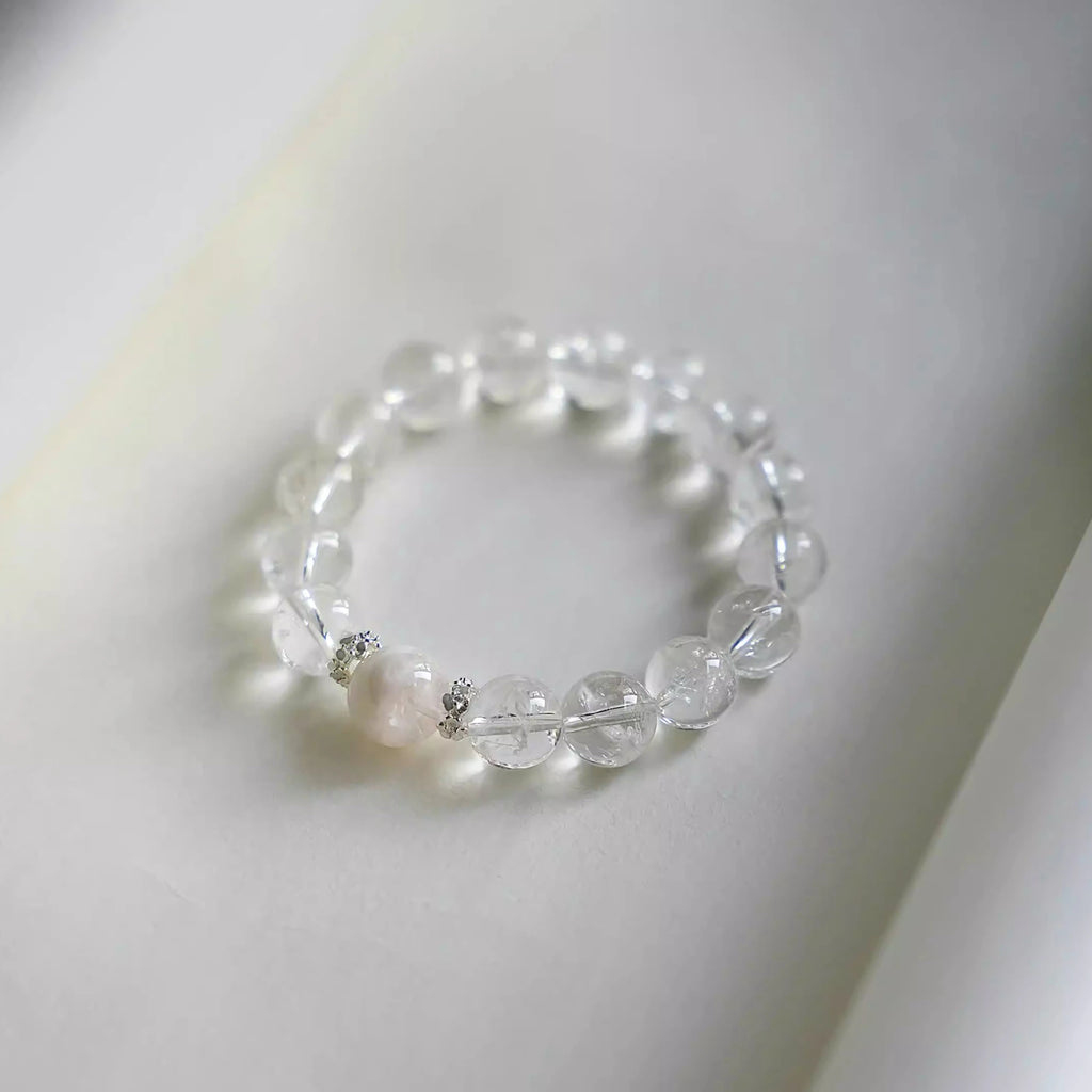 Elegant clear quartz bracelet for calm and healing energy – designer crystal jewelry for mindfulness and spiritual wellness.
