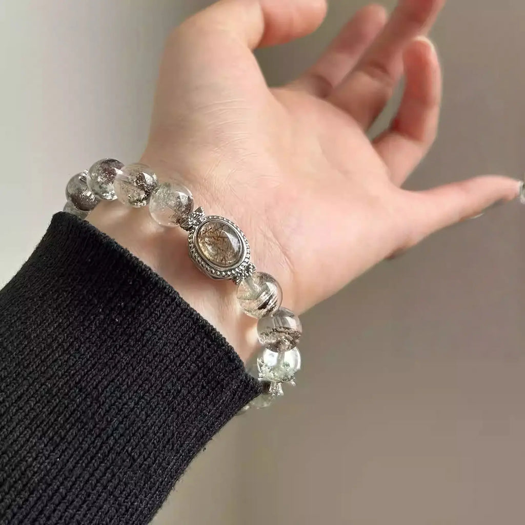 Green phantom quartz bracelet designed to attract wealth, abundance, and career success – powerful crystal jewelry.