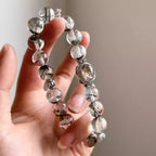 Green phantom quartz bracelet, a spiritual accessory for wealth, career achievements, and abundance energy.