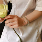 Woman wearing green phantom quartz double wrap bracelet for wealth, luck, and career growth – stylish crystal jewelry for success and positive energy.