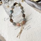 Grey and orange moonstone bracelet with smoky quartz for emotional balance, confidence, and grounding energy – natural healing crystal jewelry.
