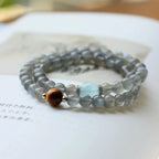 Elegant double wrap moonstone and aquamarine bracelet, designed to soothe emotions and enhance intuitive insight.