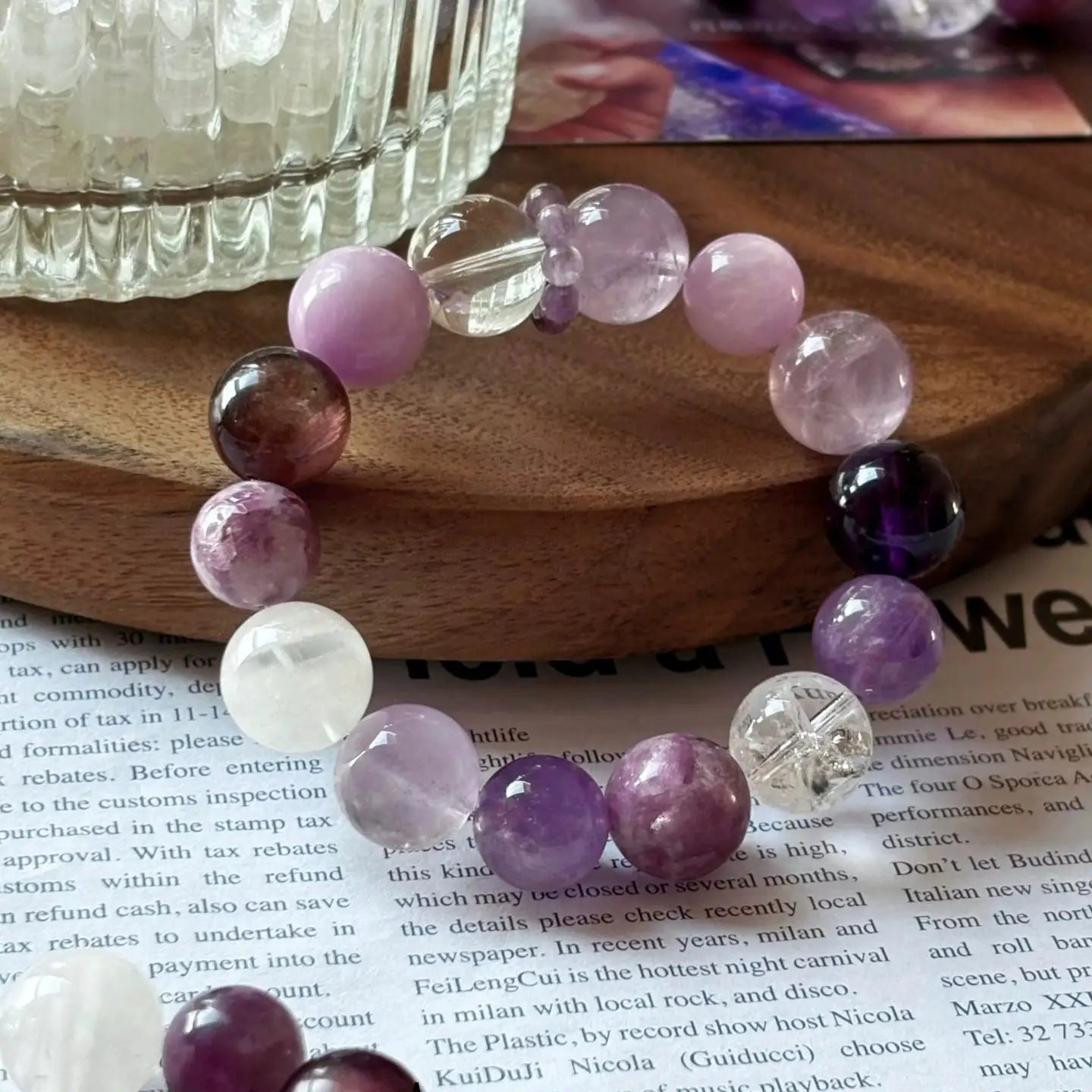 Close-up of multi-tone amethyst and clear quartz beads, enhancing intuition, calmness, and mindful energy.