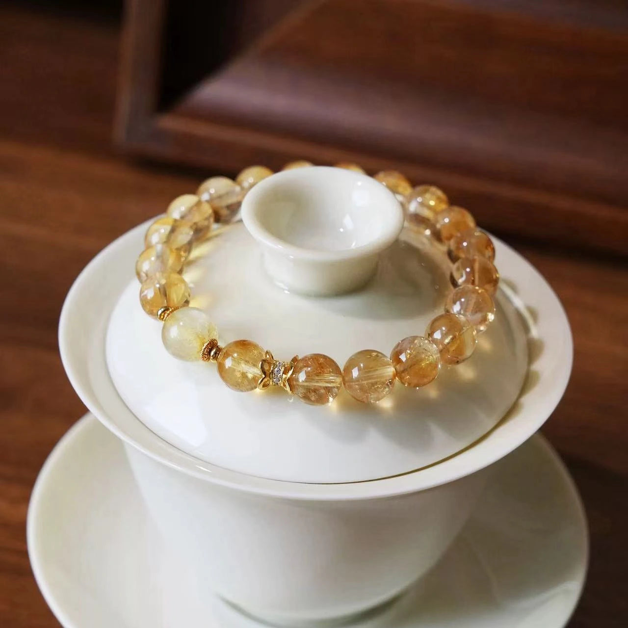 Natural citrine crystal bracelet featuring warm golden crystal beads with polished surfaces.