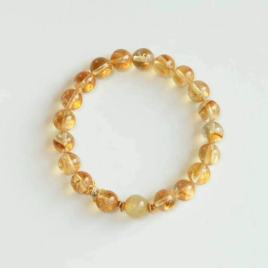 Natural citrine crystal bracelet with polished golden beads, a handcrafted crystal jewelry piece for daily wear.