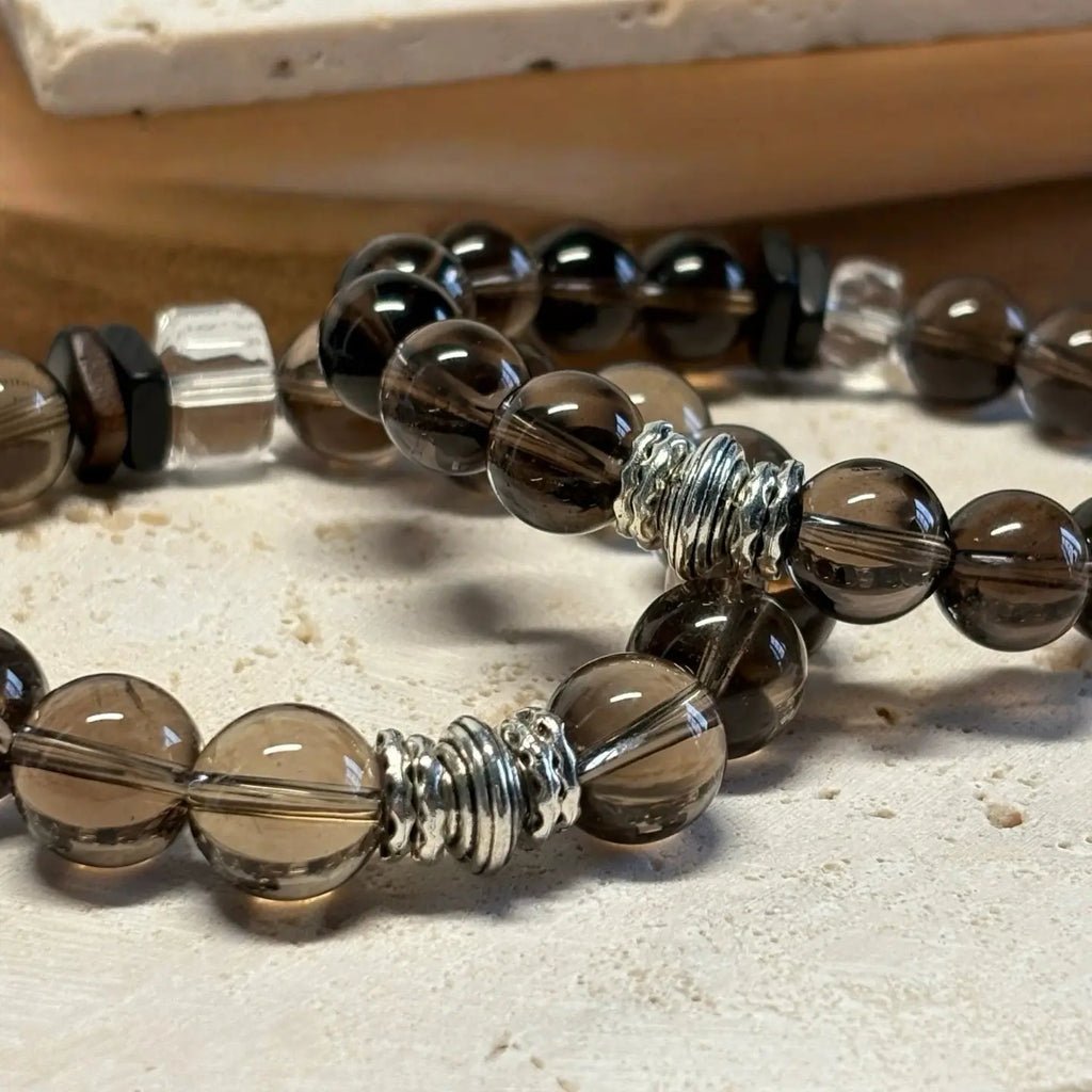 Smoky quartz bracelet, a crystal accessory for energy cleansing, stability, and inner power.