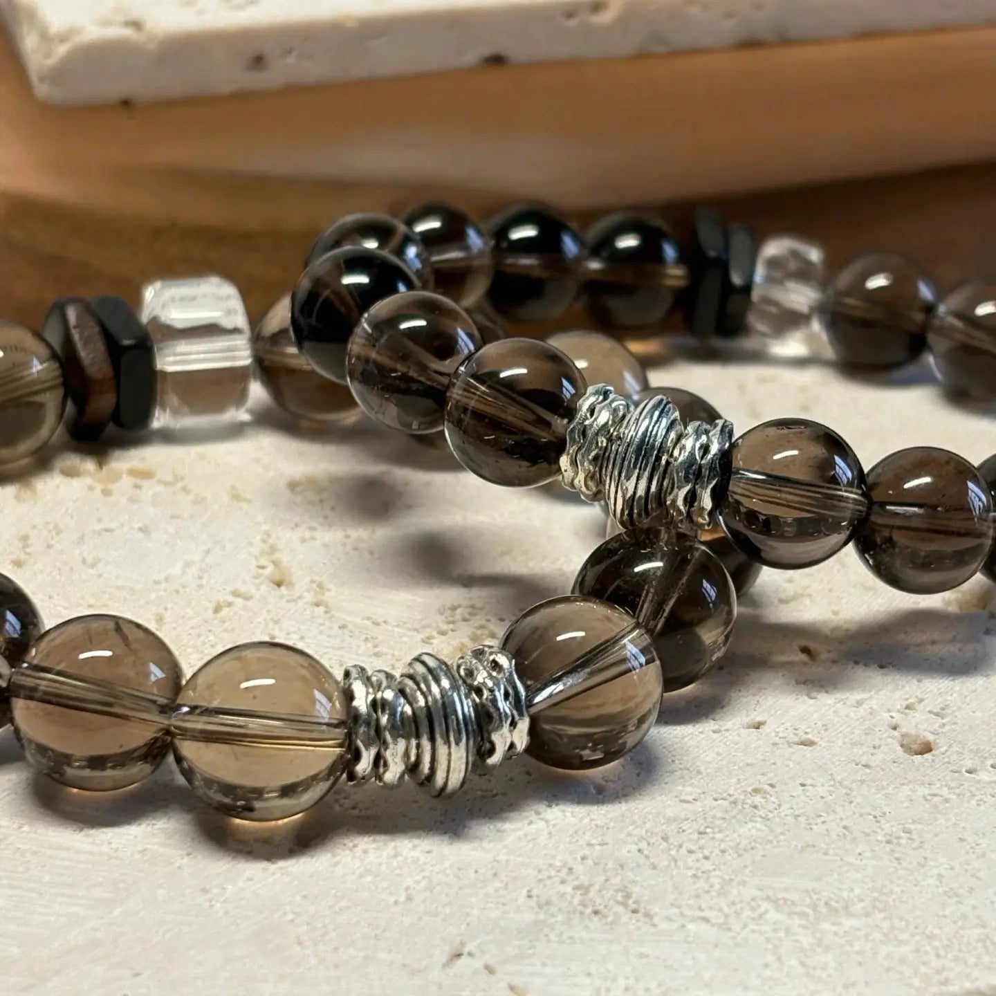 Smoky quartz bracelet, a crystal accessory for energy cleansing, stability, and inner power.