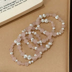 Rose quartz bracelet with silver cat’s eye beads for love, emotional healing, and heart chakra balance – designer crystal jewelry.