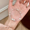 Elegant rose quartz and silver cat’s eye bead bracelet, promoting romance, positive energy, and inner calm – real crystal accessory.