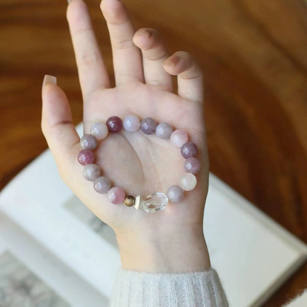 Artisan bracelet with pink rose quartz and clear quartz, enhancing emotional wellness, love attraction.
