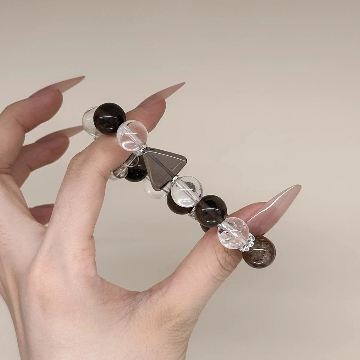 Smoky quartz and clear quartz bracelet for grounding, stress relief, and emotional stability – natural healing crystal jewelry.