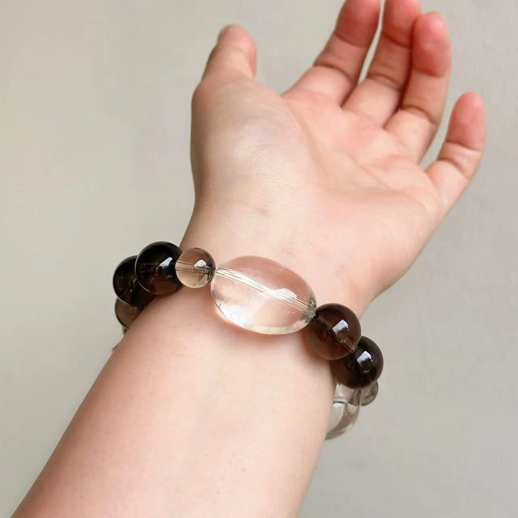 Everyday crystal bracelet with smoky quartz and clear quartz for a neutral, versatile look.