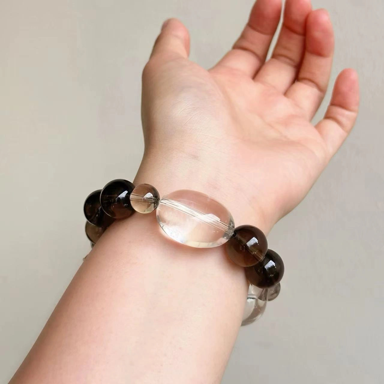 Everyday crystal bracelet with smoky quartz and clear quartz for a neutral, versatile look.
