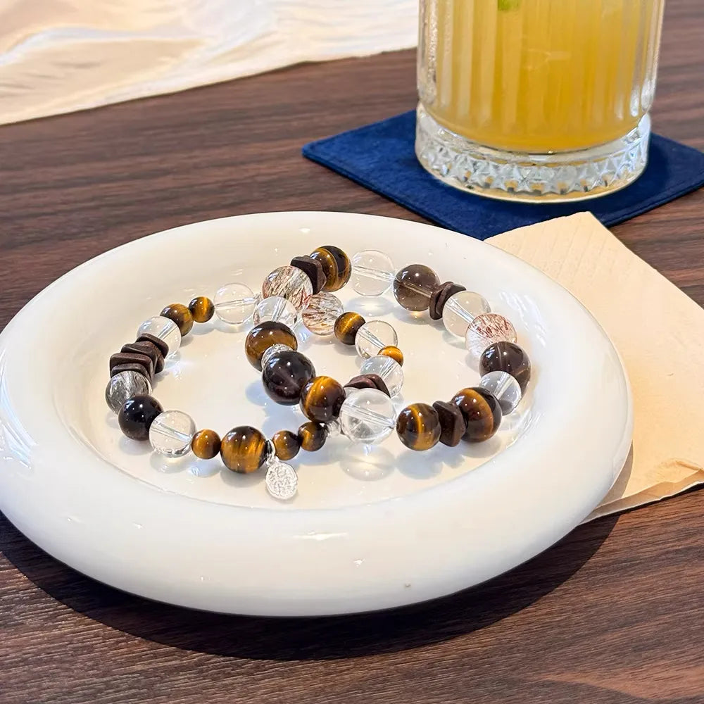 Tiger eye, clear quartz and agarwood bracelet designed for protection, clarity, and grounding energy – natural healing crystal jewelry.