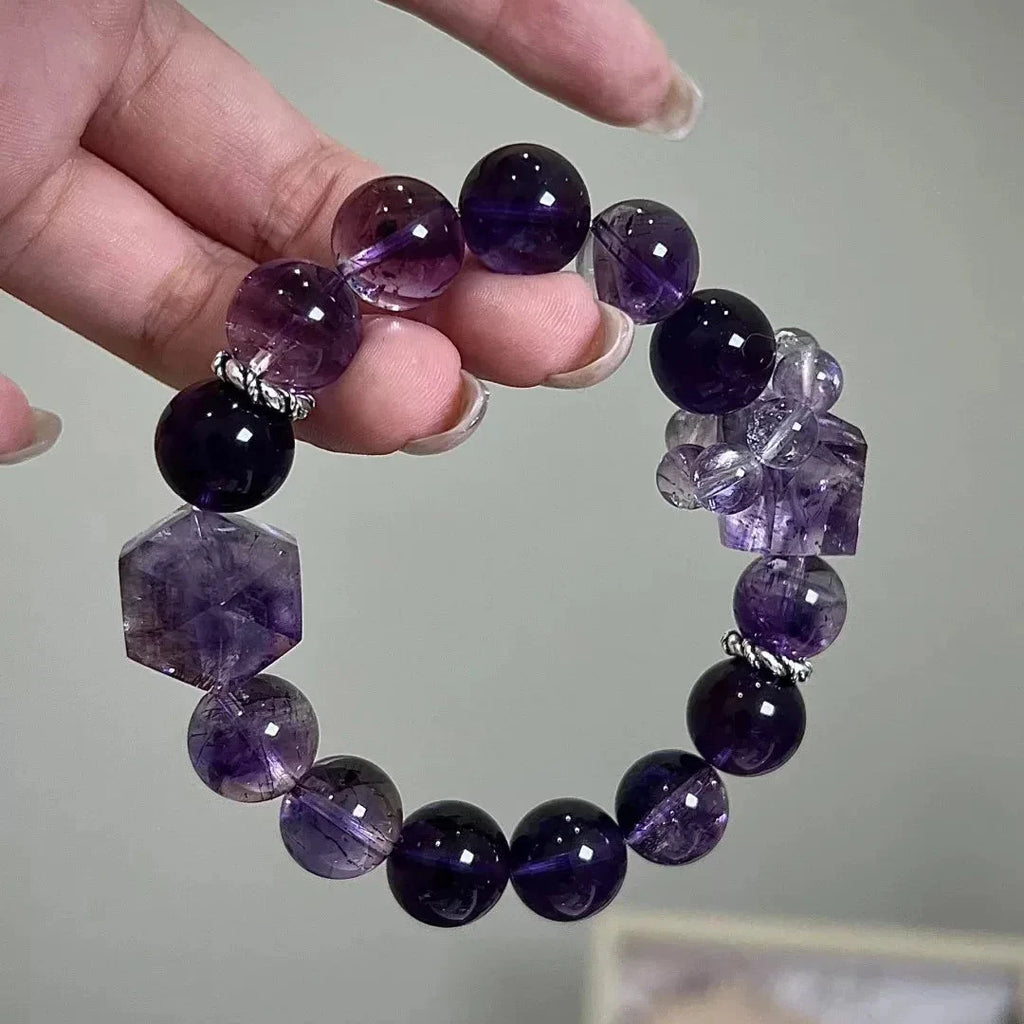 Vintage amethyst bracelet featuring rich purple beads with natural clarity and depth.
